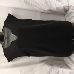 Women's black sleeveless blouse by Love Scarlett. Size Large.